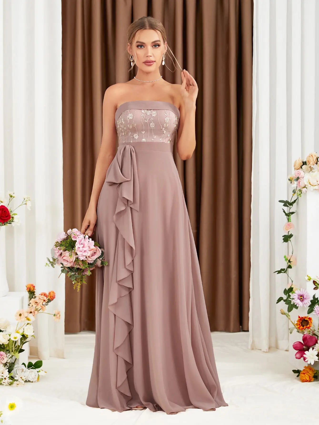 The adult formal dress is wrapped around the chest and decorated with a belt on the back